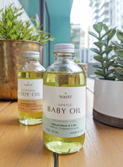 Gentle Baby Oil: Natural massage oil that relaxes your baby and gently nourishes skin. 4oz glass bottle